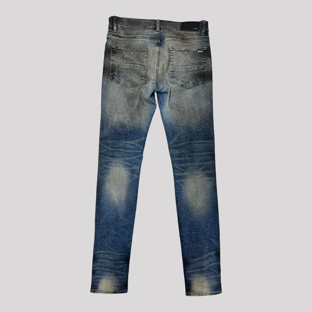 Amiri Dirty Indigo Cashmere Patch MX1 Distressed Denim Jeans