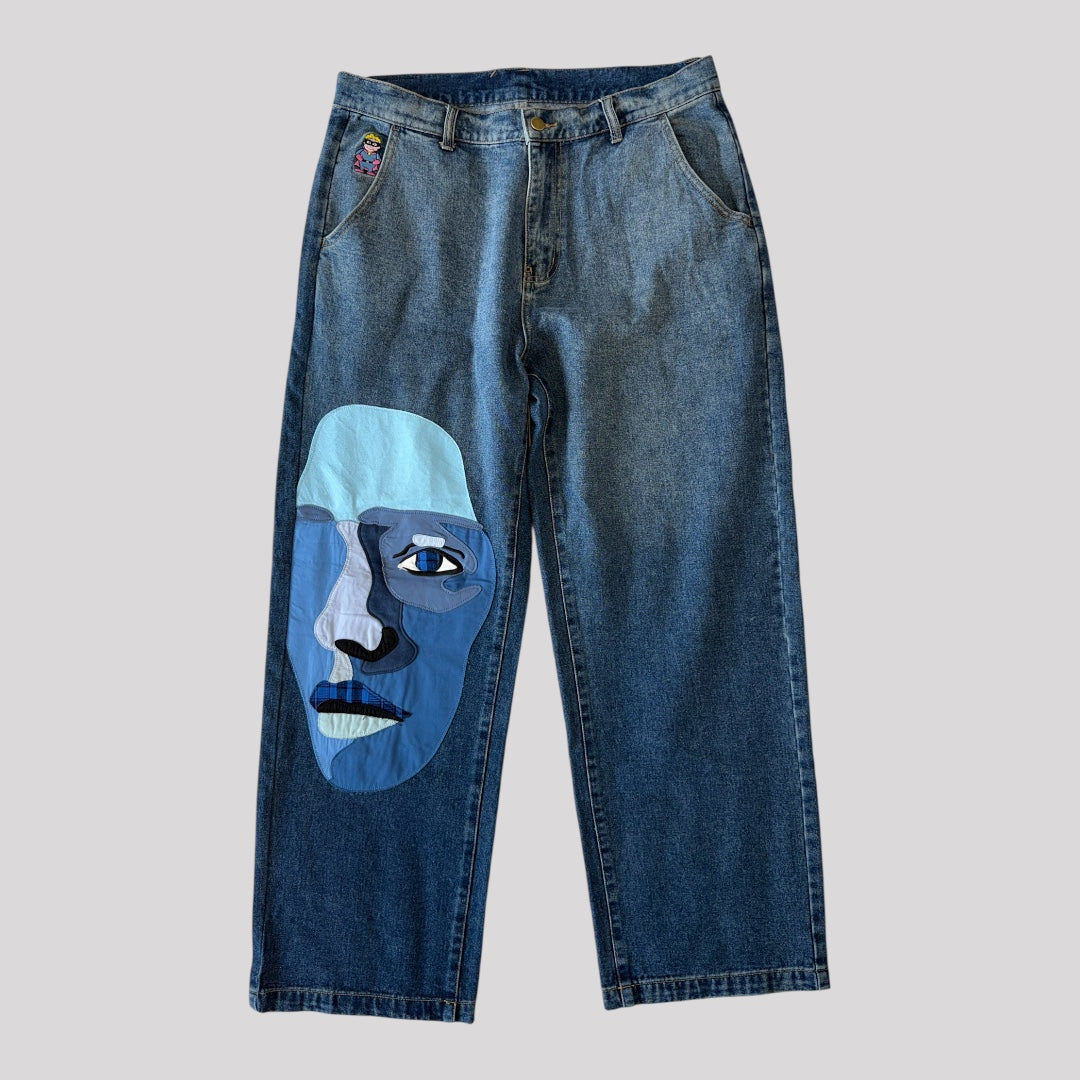 KidSuper Face Patchwork Straight Leg Jeans